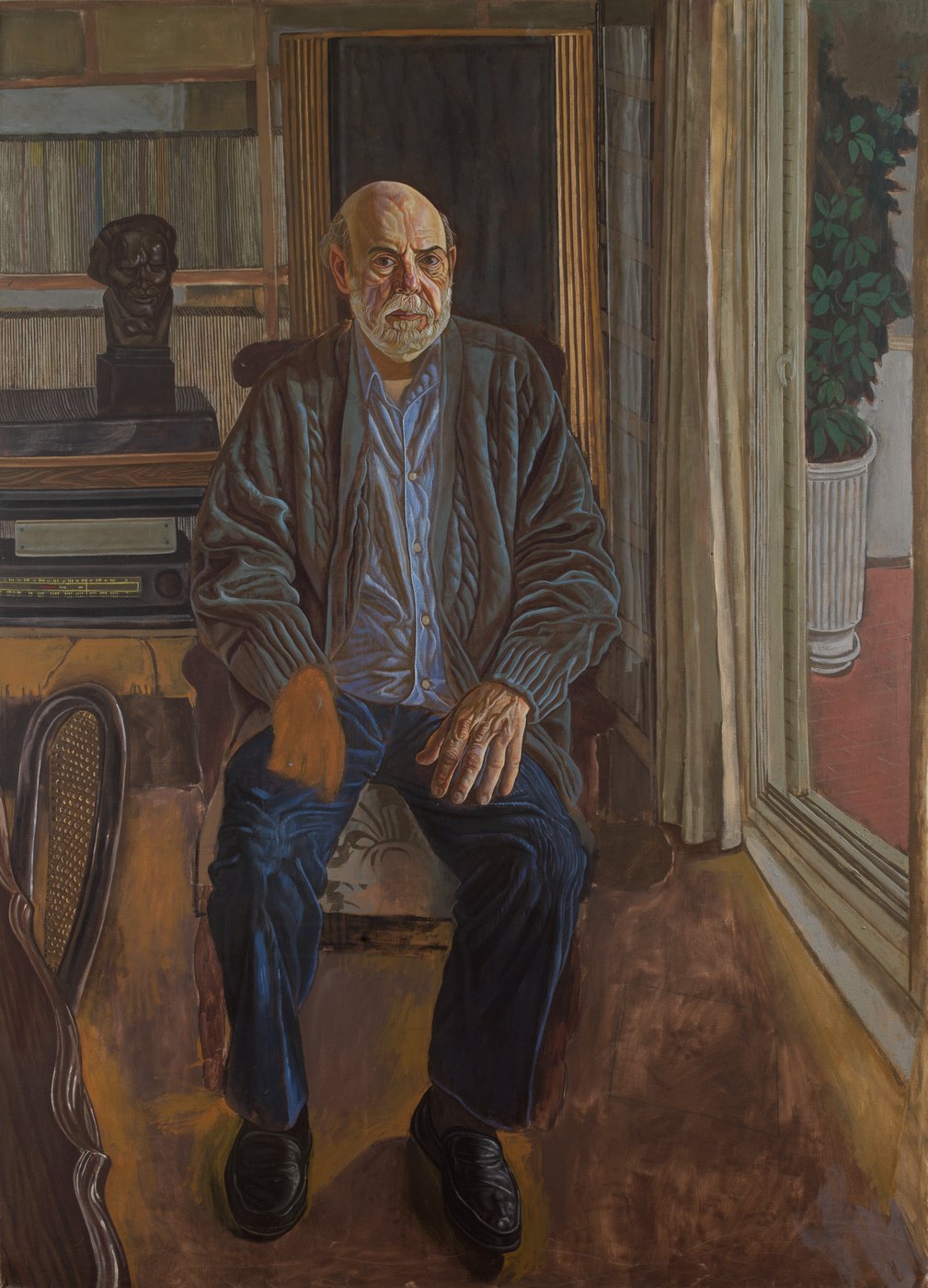 Aris Mertilis, Remaining (Παραμονή), oil on canvas. Bearded man in a cardigan, a sculpted head on the cabinet behind him.